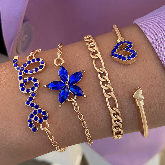 Set di 4 bracciali blu con fiori, farfalle e cuori adornati di strass