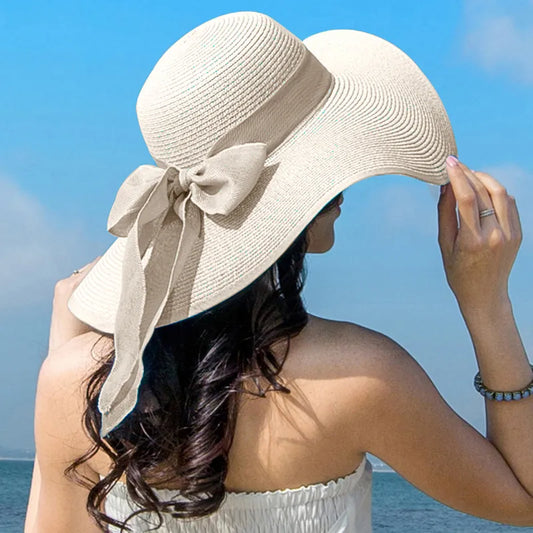 Cappello da donna estivo in paglia con fiocco a tesa larga floscio